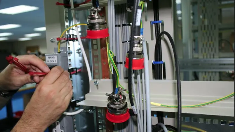 Close up of hands and computing equipment
